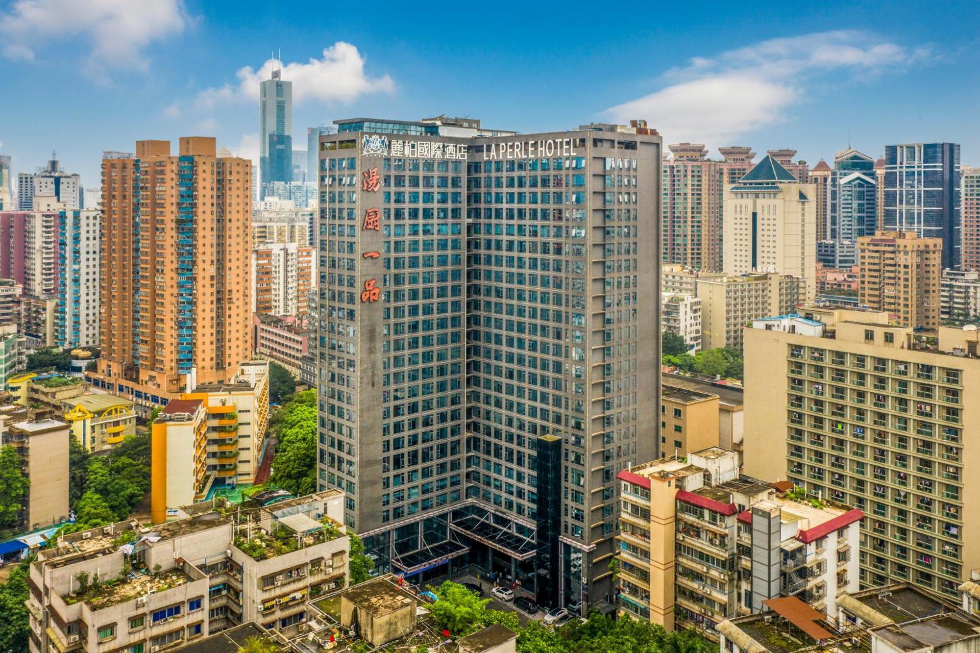 La Perle International Hotel - Free Shuttle Between Hotel And Exhibition Center During Canton Fair & Exhibitor Registration Counter Buitenkant foto
